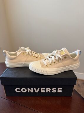 Converse Low Top Sneakers in Light Cream with Gold Eyelets
